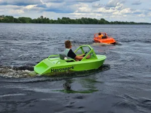 brothers have fun with mini jet boat